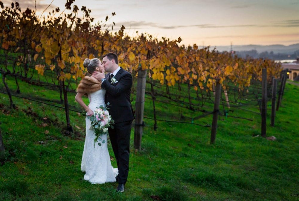 Photo of a micro wedding package photo shoot held at a vineyard in fall.
