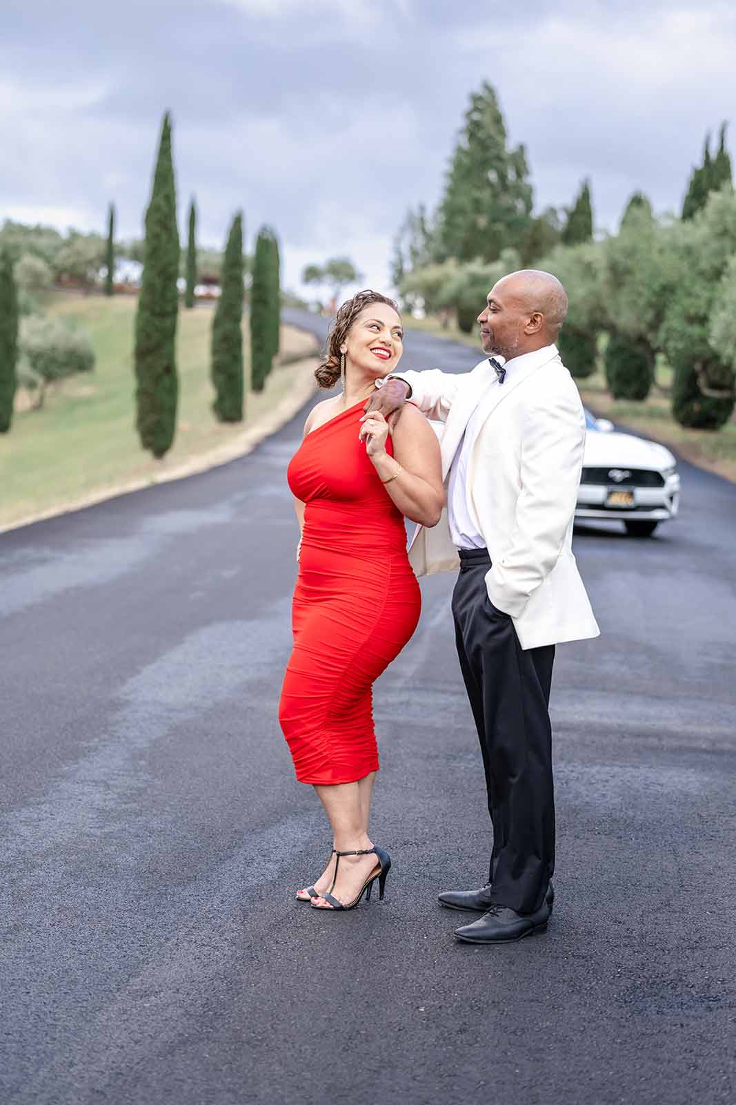 Samar Hattar & Courtney Hazelwood will marry at Viansa Winery. They stand in Viansa's driveway looking into each other's eyes. photos by Sheila at Studio J Photography.