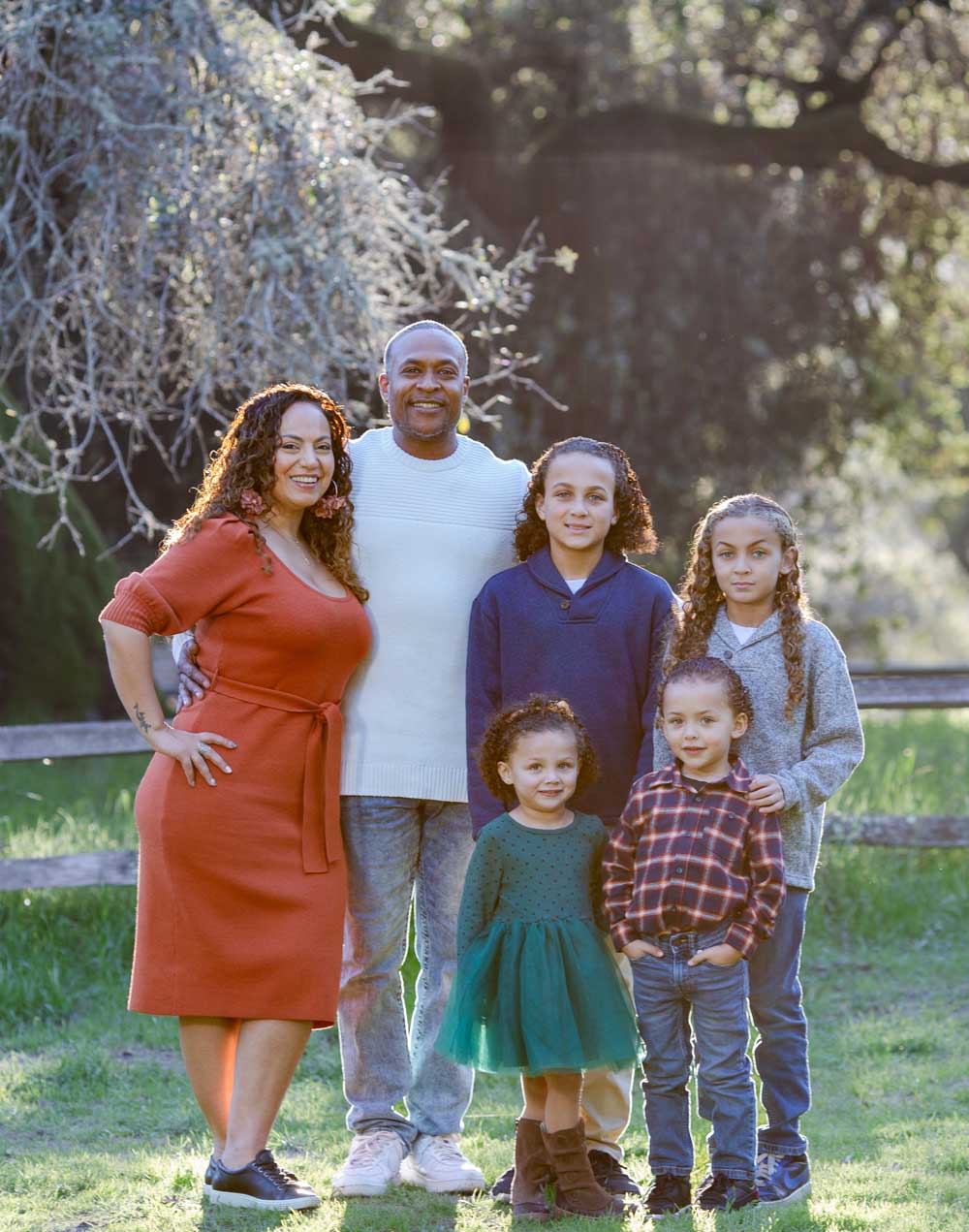 Samar Hattar & Courtney Hazelwood with four of the six kids captured in an impromptu family photo session by Studio J Photography. 